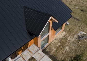 high-angle-beautiful-wooden-house-with-new-roof high-angle-beautiful-wooden-house-with-new-roof